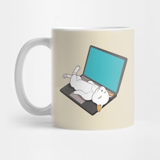 cat sleeping on laptop Mug